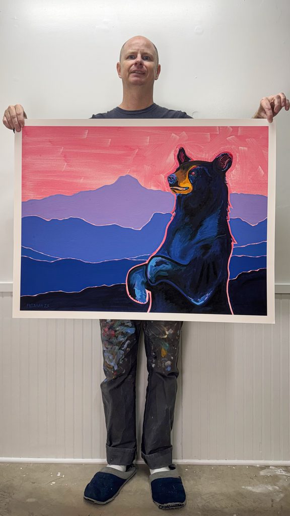The artist with his work.